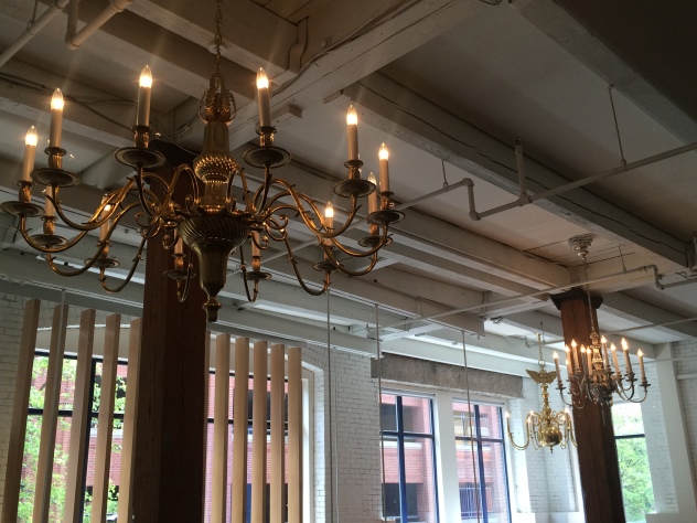 Old and new: historic chandeliers in the upper commons of 24 Farnsworth